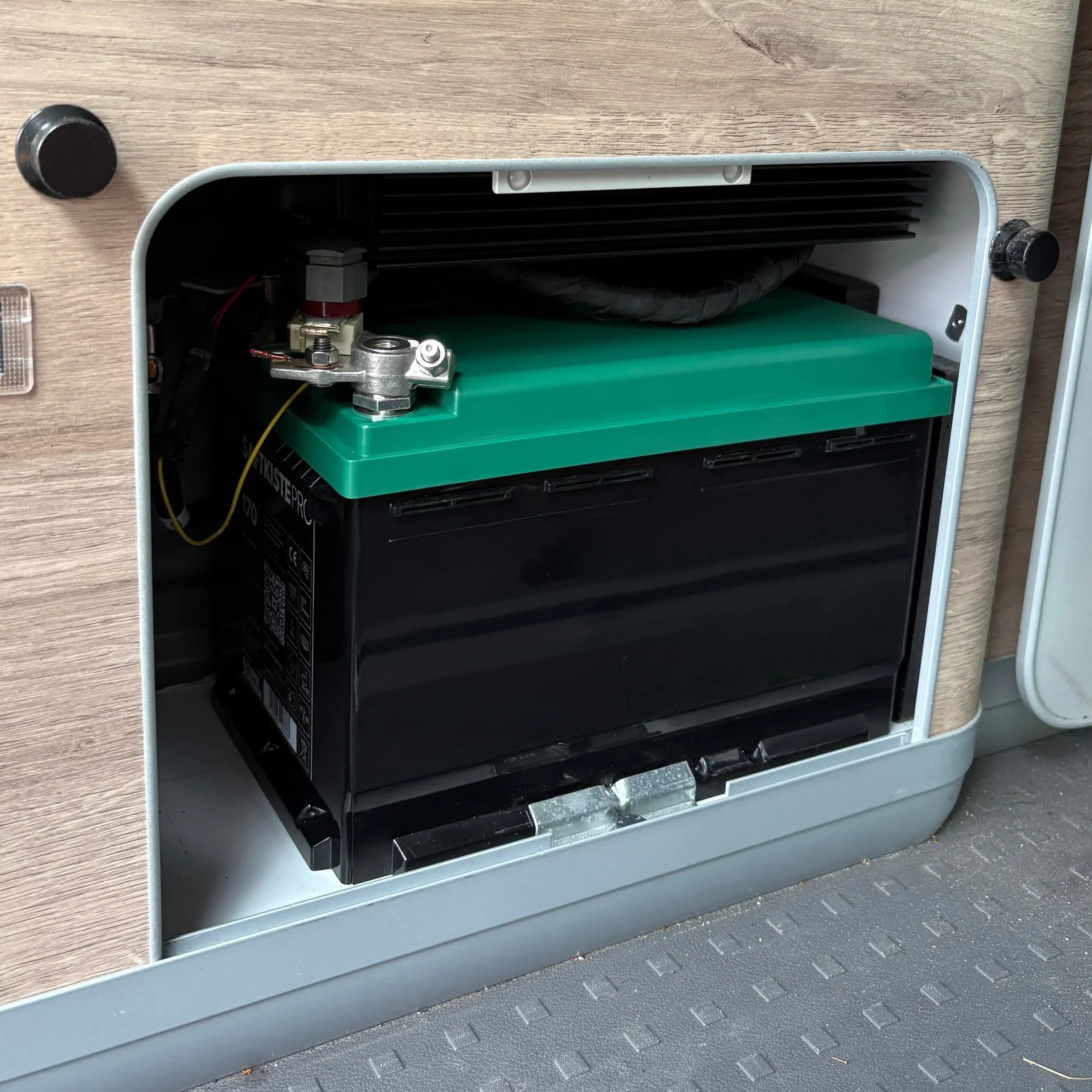LiFePO4 battery installed in VW California camper storage compartment