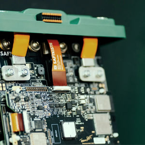 Close-up of lithium battery pack for VW California with circuit board and orange power cables