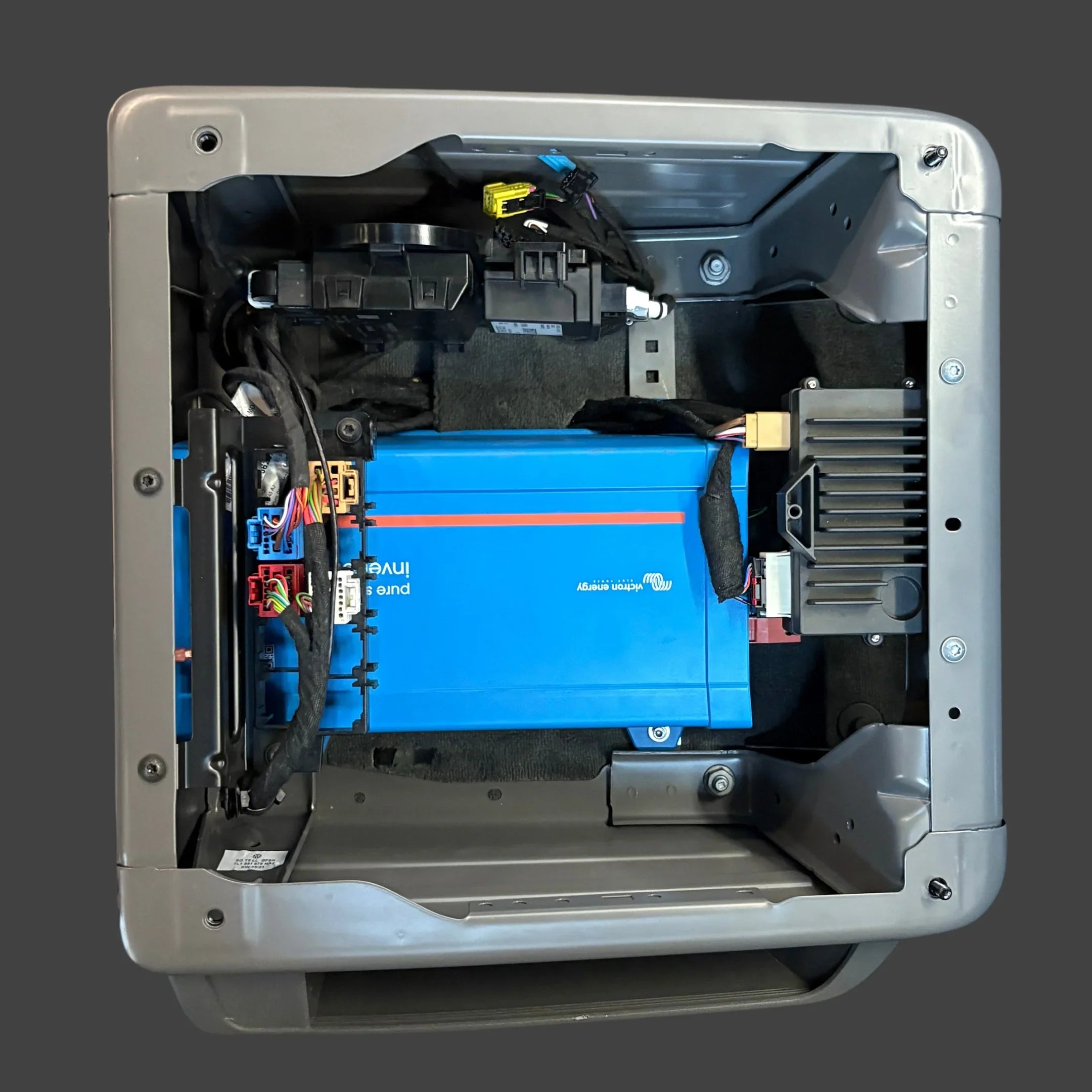 Victron Phoenix 12/1200 inverter installed in VW California compartment, top view